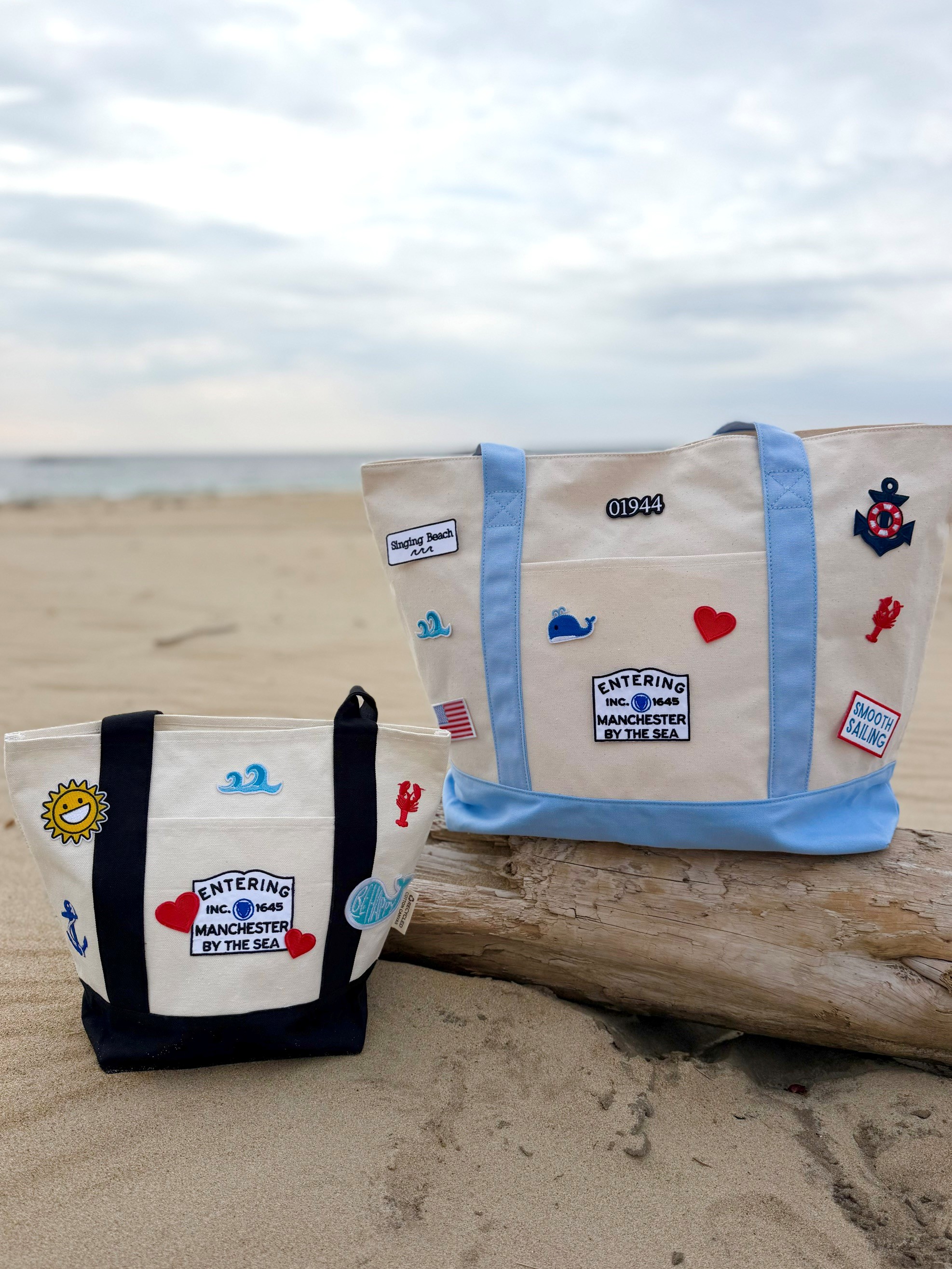 Handmade patch totes on the beach by Towne and Main