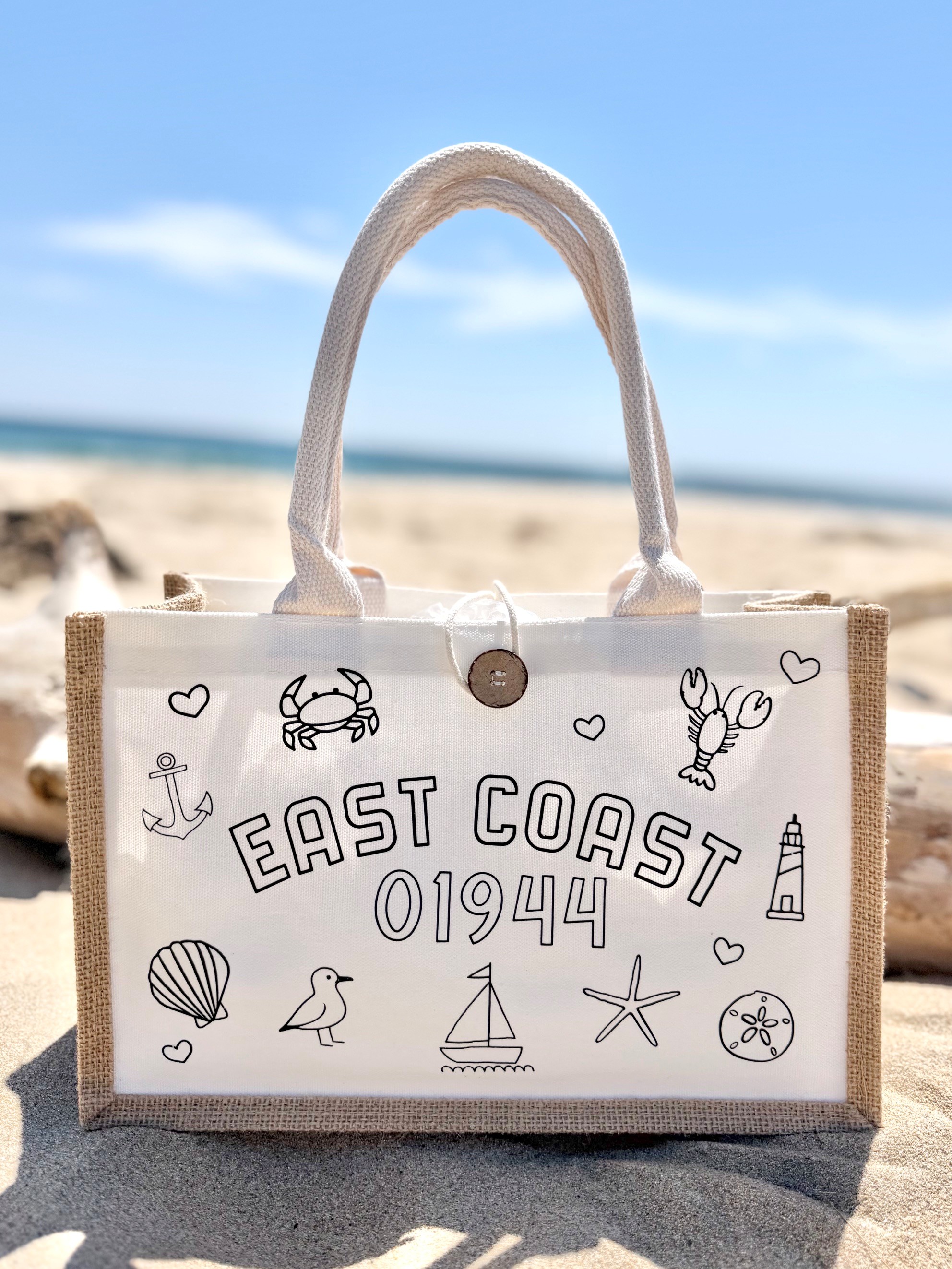 Custom totes and pouches on the beach